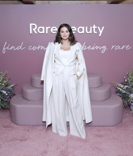 Selena Gomez all white look at the launch of rare beauty find comfort body collection - Fashion Police Nigeria