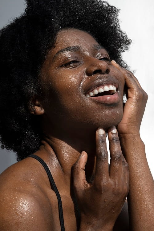 Photo of black woman with a hydrated skin-Fashion Police Nigeria