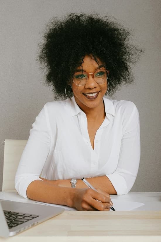 Beautiful of African American woman wearing eyeglass in the office - Fashion Police Nigeria