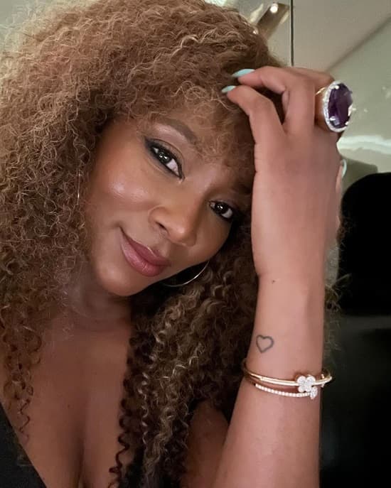 Genevieve Nnaji celebrates 45th birthday in a black slip dress and layered blazer - Fashion Police Nigeria