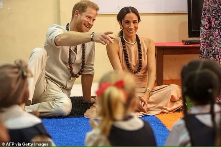 Photo of Meghan Markel wearing sleeveless beige dress on her first visit to Nigeria with Prince Harry - Fashion police Nigeria