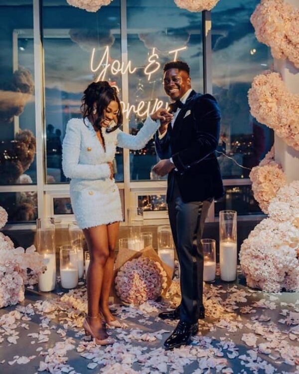 Woman feeling emotional during a surprise proposal photo - Fashion Police Nigeria