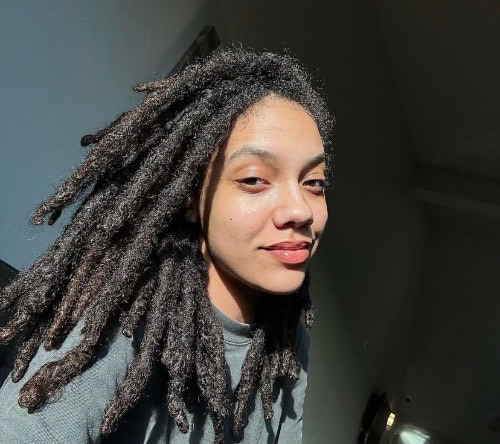 Photo of a woman on natural locs