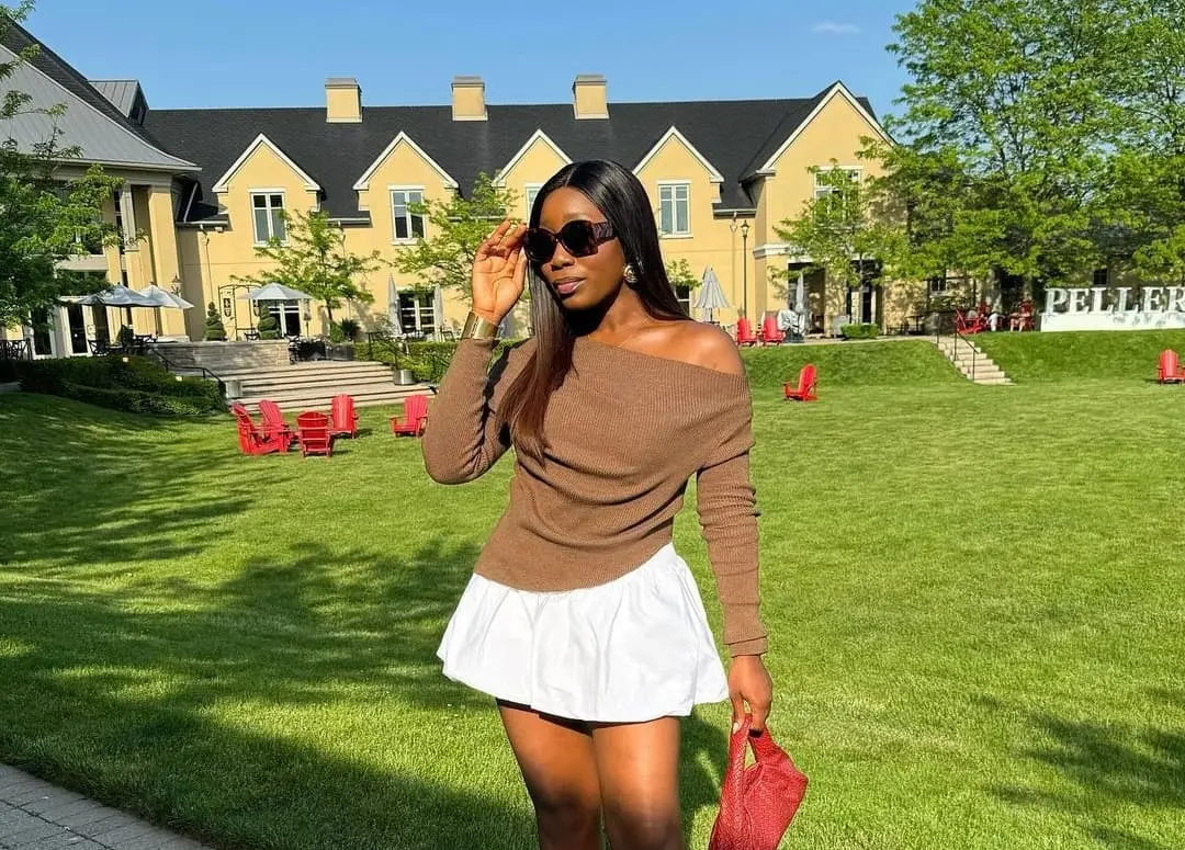 A beautiful black woman wearing white puffball skirt - Fashion Police Nigeria