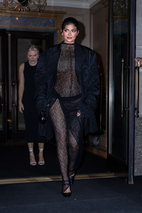 Kylie Jenner black lace catsuit maternity fashion - Fashion Police Nigeria