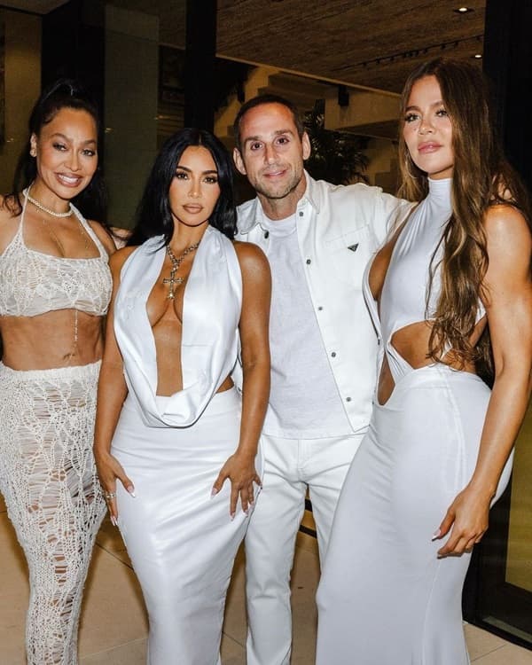 Kim Kardashian plunging latex gown white party - Fashion Police Nigeria