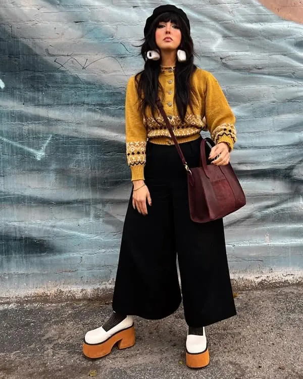 Photo of a beautiful woman wearing a vintage block heeled sandals with a vintage cardigan  - Fashion Police Nigeria