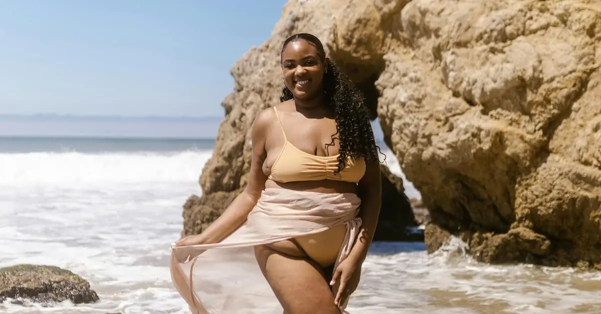 Photo of African American plus-size woman wearing a swimsuit at the beach - Fashion Police Nigeria