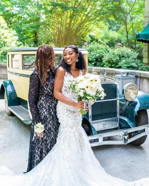 Photo of mother with her bride daughter posing for a photo - Fashion Police Nigeria 