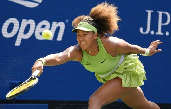 Japan's Naomi Osaka plays a forehand return against latvia's Jelena Ostapenko - Fashion Police Nigeria