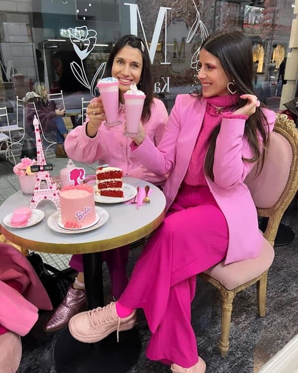 Photo of two women embracing hyper-feminine pink pastel fashion - Fashion Police Nigeria