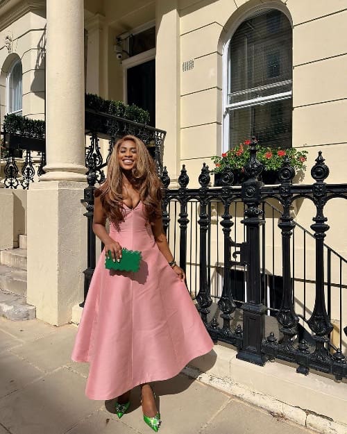 Photo of a lady wearing a pastel pink dress - Fashion Police Nigeria