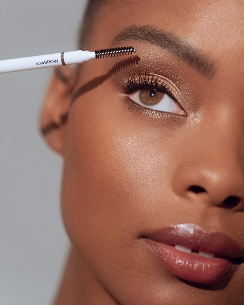 Photo of a lady with the feathered fluff eyebrows - Fashion Police Nigeria