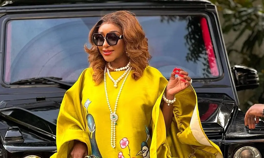 Ini Edo rich aunty yellow gown - Fashion Police Nigeria