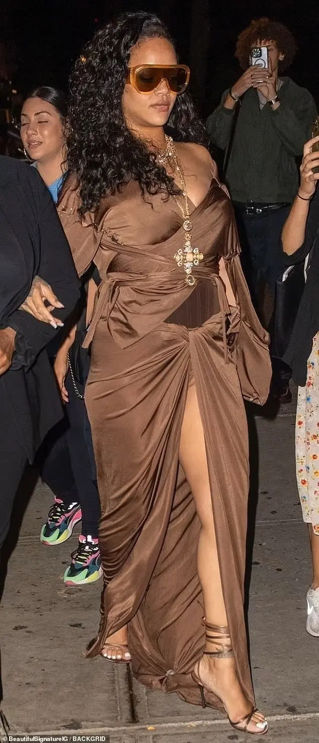 Rihanna brown silk dress fashion at 2024 New York Fashion Week 2024 - Fashion Police Nigeria