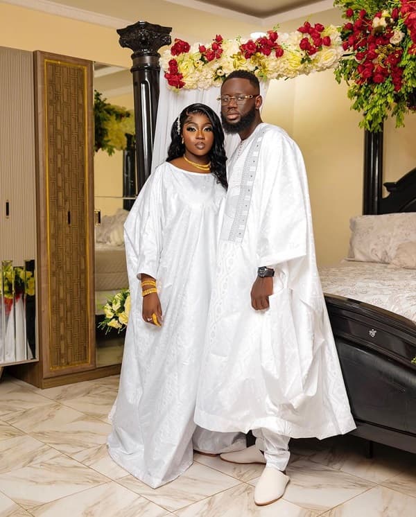 Photo of Gambian bride and groom wearing a white kaftan during traditional wedding - Fashion Police Nigeria