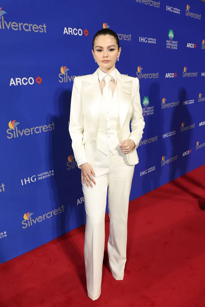 Photo of Selena Gomez wearing a white tuxedo at the 2025 Palm Spring International Film Awards - Fashion Police Nigeria