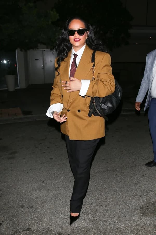 Rihanna Keeps it Business Professional in a Mismatched Pantsuit for Her 37th Birthday