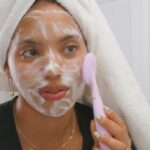 Woman having her skincare routine with a face mask - Fashion Police Nigeria