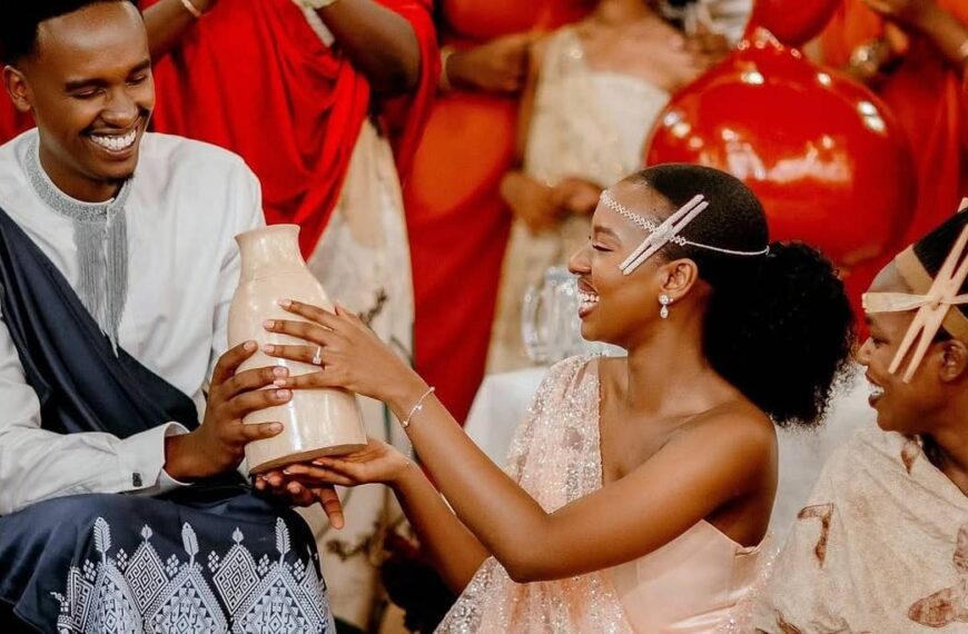 Photo of Rwandan bride and groom sitting during their wedding celebration - Fashion Police Nigeria