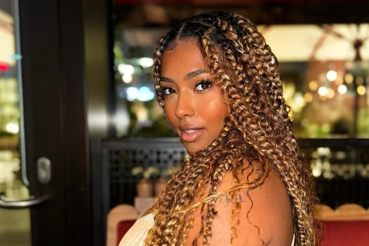 A beautiful African woman wearing brown box braids - Fashion Police Nigeria
