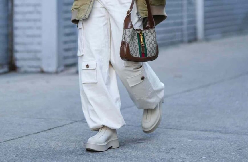 Woman wears cargo pants for street style during fashion week
