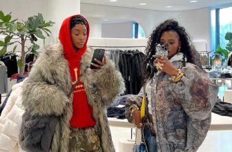 Two fashion girls checking phone and taking selfie - Fashion Police Nigeria
