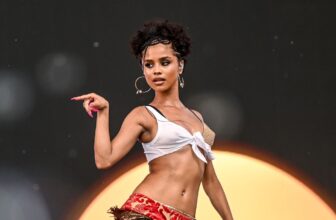 Tyla's Coachella's Look Includes a Tiny White Top, Gold Pants, and Torn Fishnet Tights