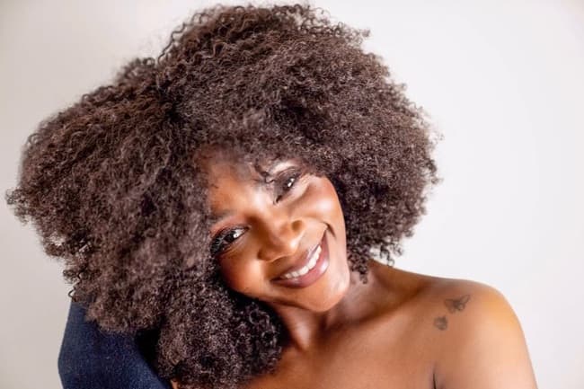 Genevieve Nnaji afro curly hairstyle photo - Fashion Police Nigeria