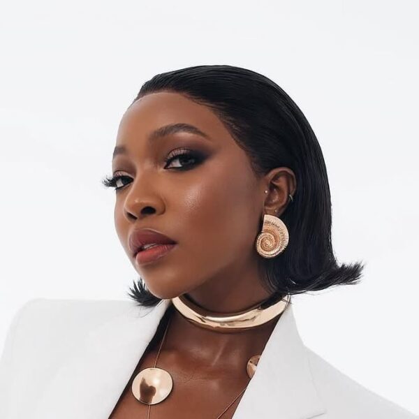 Ini Dima-Okojie Just Marked Her 35th Birthday in a White Blazer and Super Wide-Leg Pants - Fashion Police Nigeria