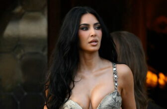 Kim Kardashian Looks Glamorous in a Skin-Hugging Snakeskin Dress in Venice