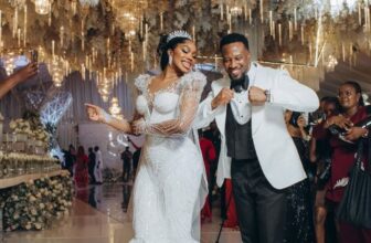 Photo of Sharon Ooja and husband at wedding - Fashion Police Nigeria