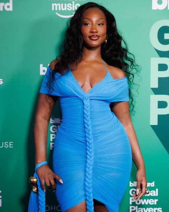Tems Just Served a Glamorous Look in a Ruched Schiaparelli Bodycon Dress