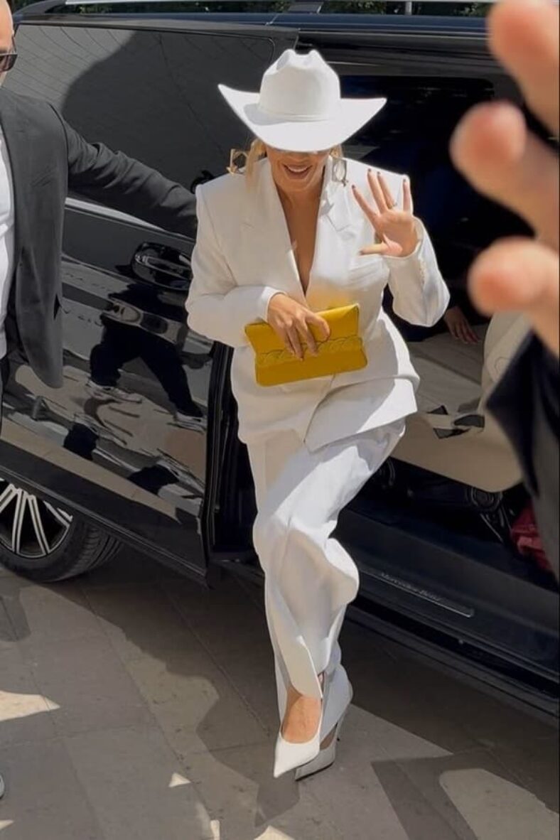 Beyonce Embraced the Ultimate Cowgirl Look in White Pantsuit in Paris | FPN
