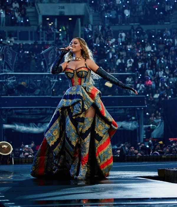 Beyonce Dazzles in a Vibrant Versace Dress at the Tottenham Cowboy Carter Show