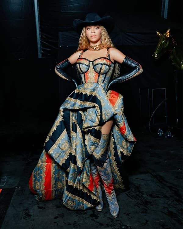 Beyonce Dazzles in a Vibrant Versace Dress at the Tottenham Cowboy Carter Show