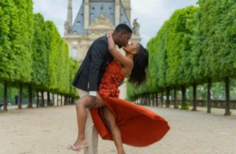 Romantic Couple Embracing in Front of Louvre - Fashion Police Nigeria