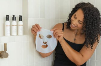 photo of a lady showing off her sheet mask - Fashion Police Nigeria