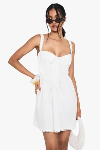 Milkmaid Dress Has Become My Summer Favorite: 15 Styles to Keep You on Trend White Milkmaid dress - Fashion Police Nigeria