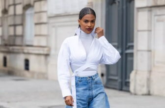 Photo of a lady wearing baggy jeans With a Layered Turtleneck - Fashion Police Nigeria
