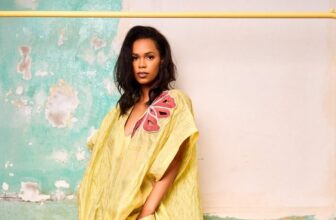 Model poses in Christie Brown yellow kaftan dress from the 2025 resort collection - Fashion Police Nigeria