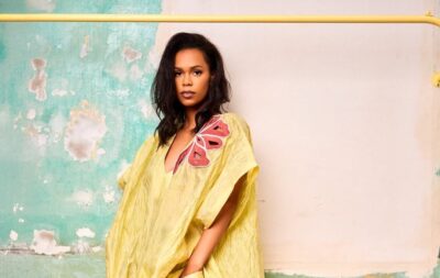 Model poses in Christie Brown yellow kaftan dress from the 2025 resort collection - Fashion Police Nigeria