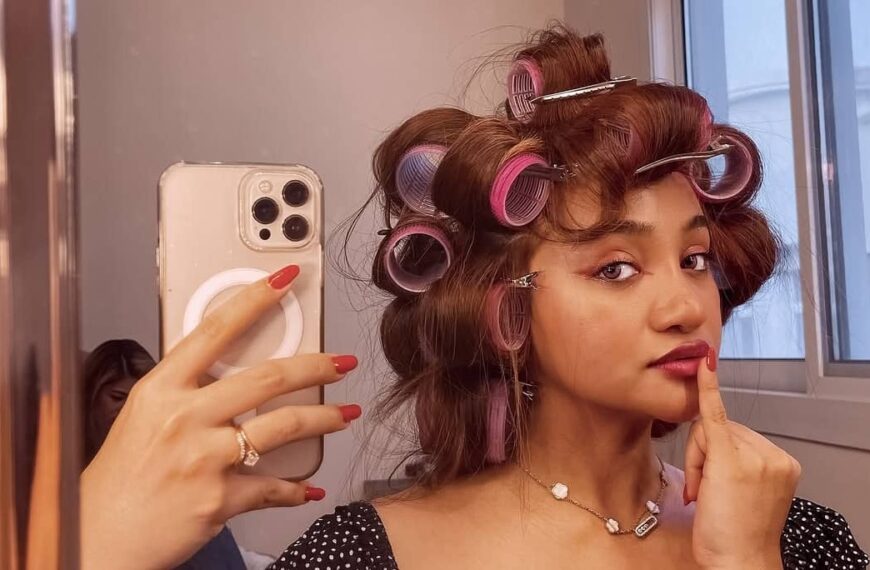 photo of a lady on heated rollers - Fashion Police Nigeria