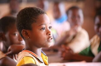 photo of a young African girl with low cut hair - Fashion Police Nigeria