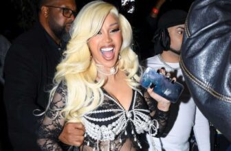 Cardi B Puts Her Growing Baby Bump on Display in a See-Through Catsuit
