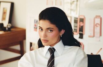 Kylie Jenner Celebrates 10 Years of Kylie Cosmetics in a Power Pantsuit