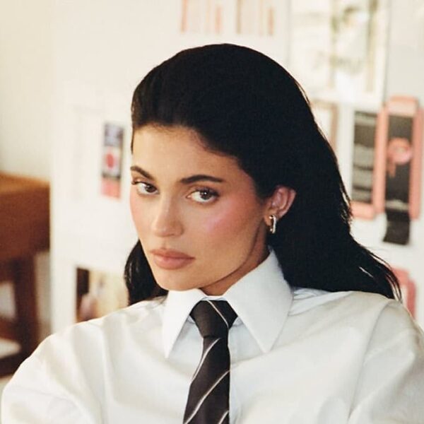 Kylie Jenner Celebrates 10 Years of Kylie Cosmetics in a Power Pantsuit