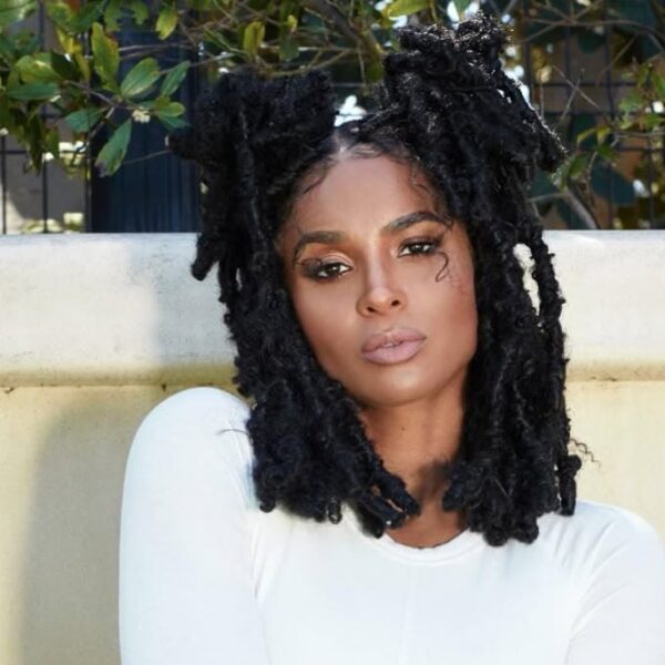 Fashion woman wears short locs hair for fall - Fashion Police Nigeria