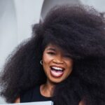 Photo of jess martinez guniess world record holder for largest afro hair - Fashion Police Nigeria