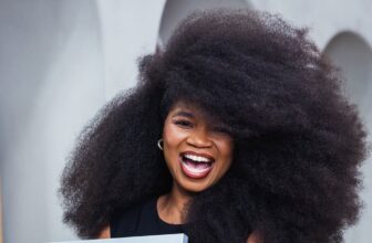 Photo of jess martinez guniess world record holder for largest afro hair - Fashion Police Nigeria